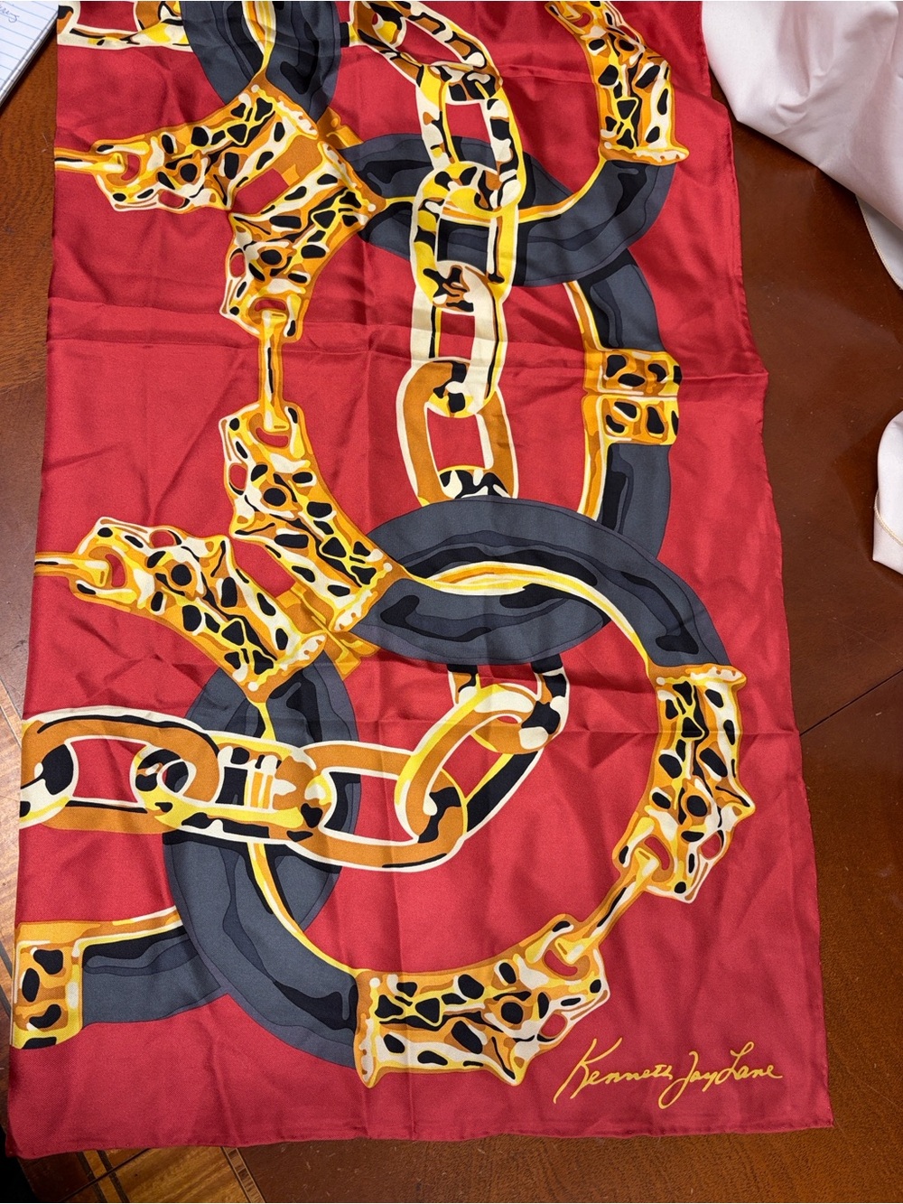 Kenneth Jay Lane Red Silk Scarf with Gold & Black Chain Motif